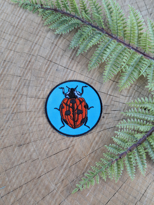 iron-on patch | ladybug - blue & red 2.5" round