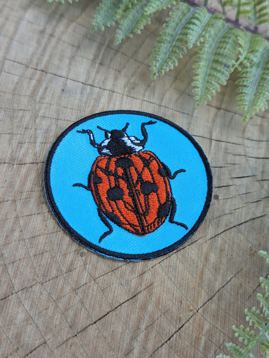iron-on patch | ladybug - blue & red 2.5" round