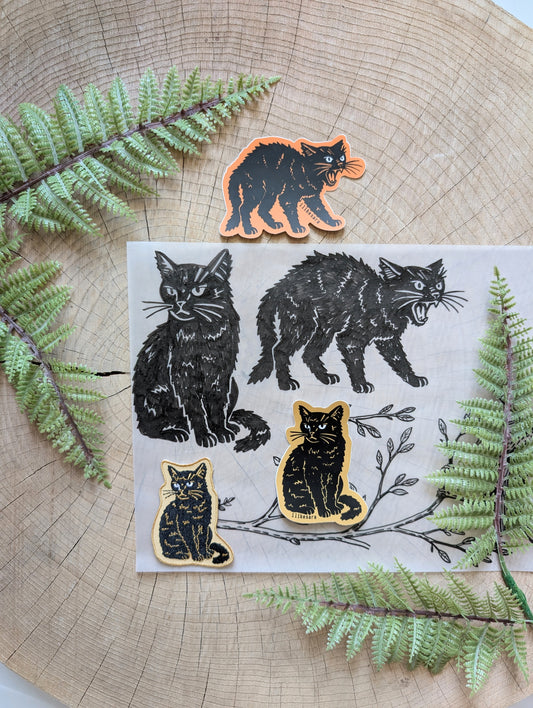 iron-on patch | sitting black disappointed cat 2.9" x 2.2"