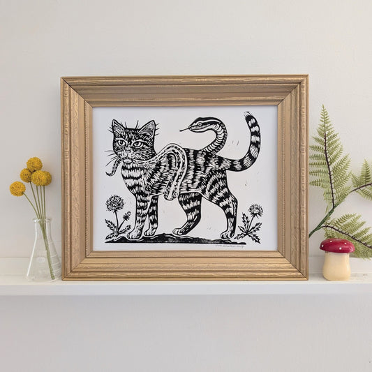 handprinted blockprint | caught (snake coiled around cat)