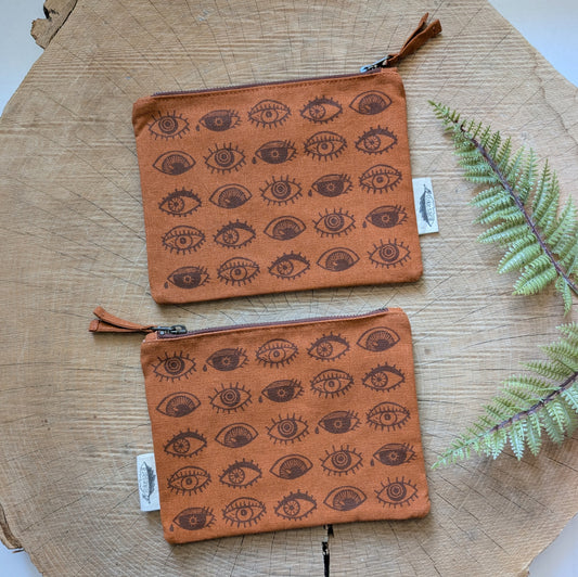 zippered pouch | eyeball - rust orange eye blockprint pencil, supply, makeup bag with waterproof lining