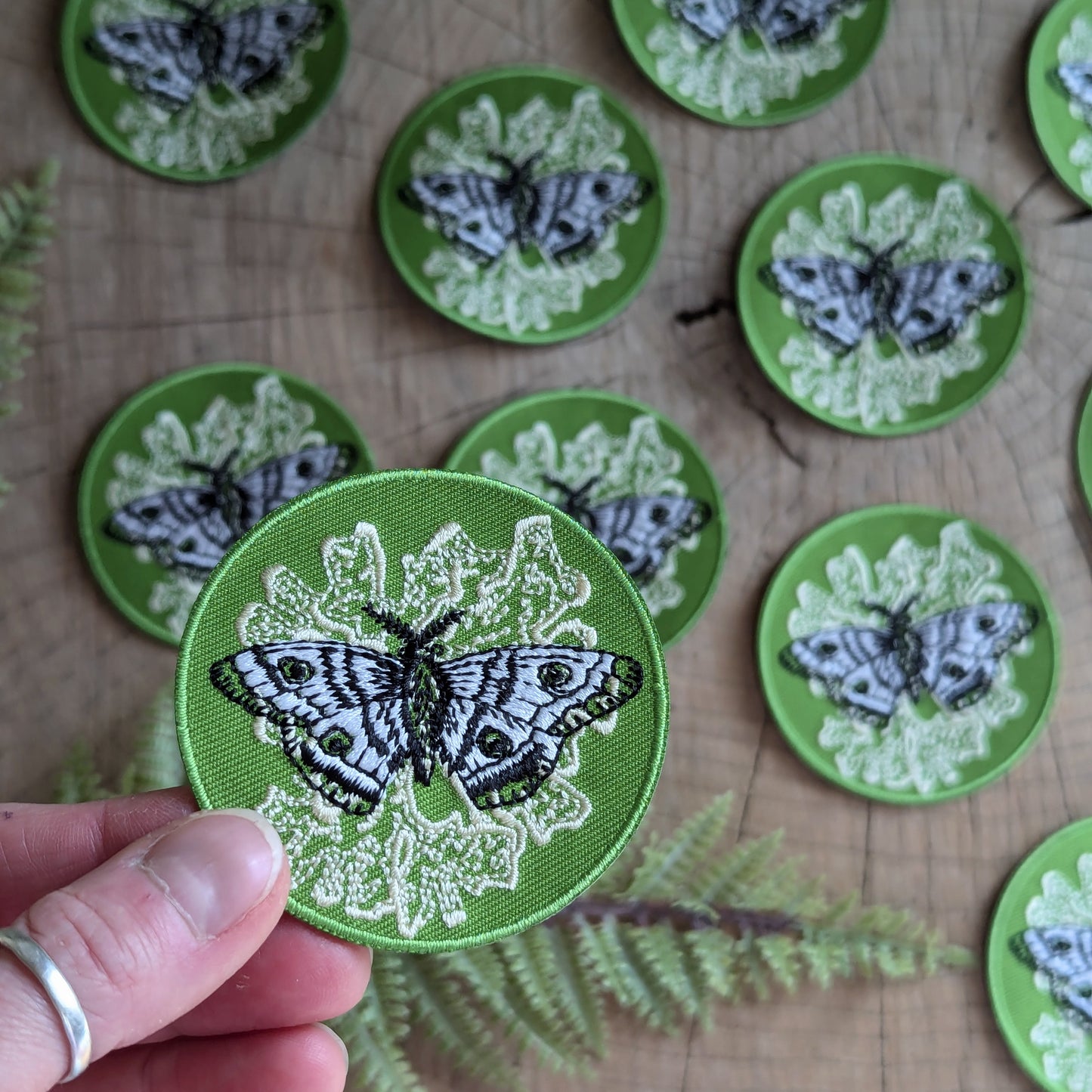 iron-on patch | polyphemus moth with lichen - green 2.5" round