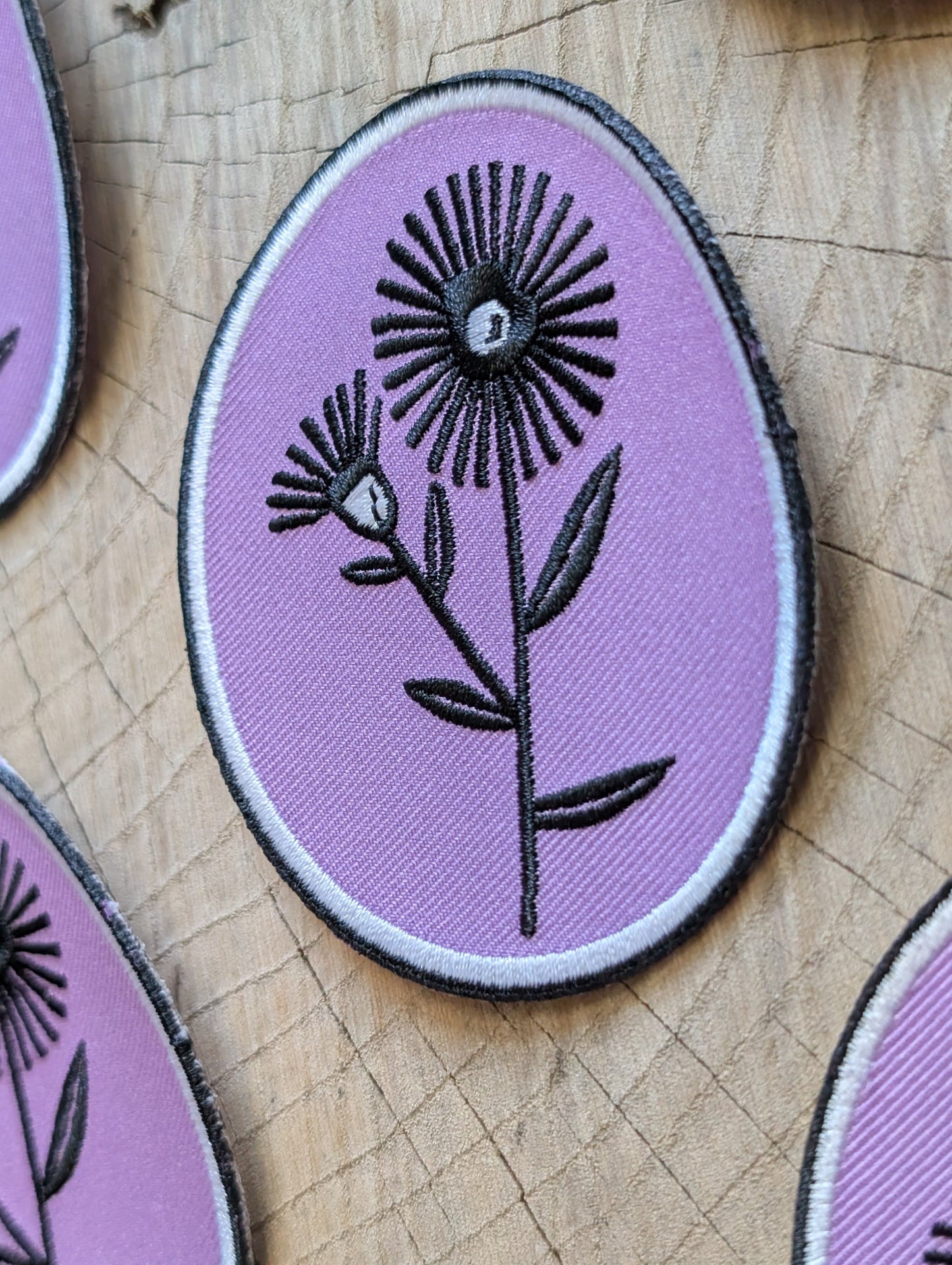 iron-on patch | aster flower - purple oval 2.75" x 3.3"