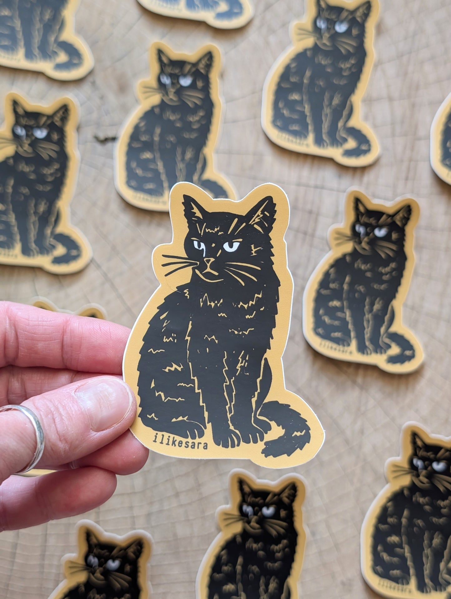 sticker | disappointed sitting black cat - waterproof uv-resistant vinyl kitty decal