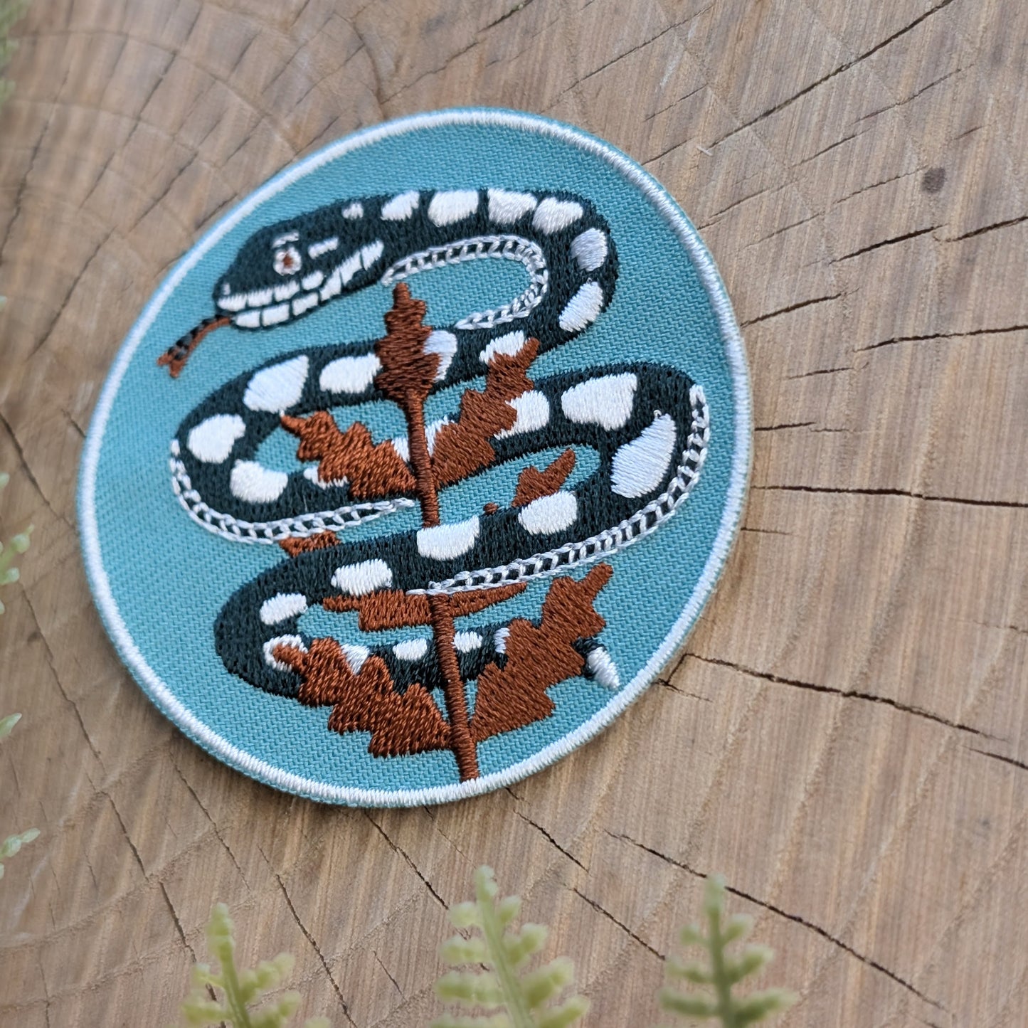 iron-on patch | serpent with fern - light teal blue snake