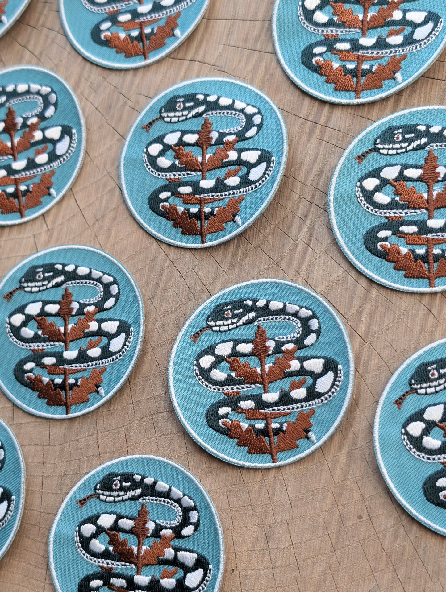 iron-on patch | serpent with fern - light teal blue snake