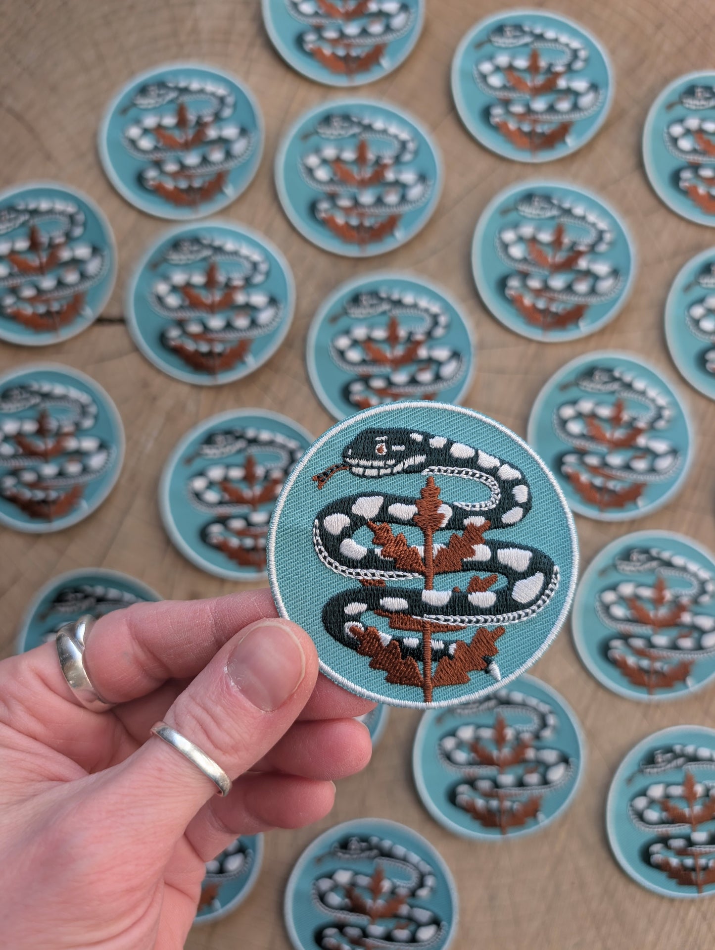 iron-on patch | serpent with fern - light teal blue snake