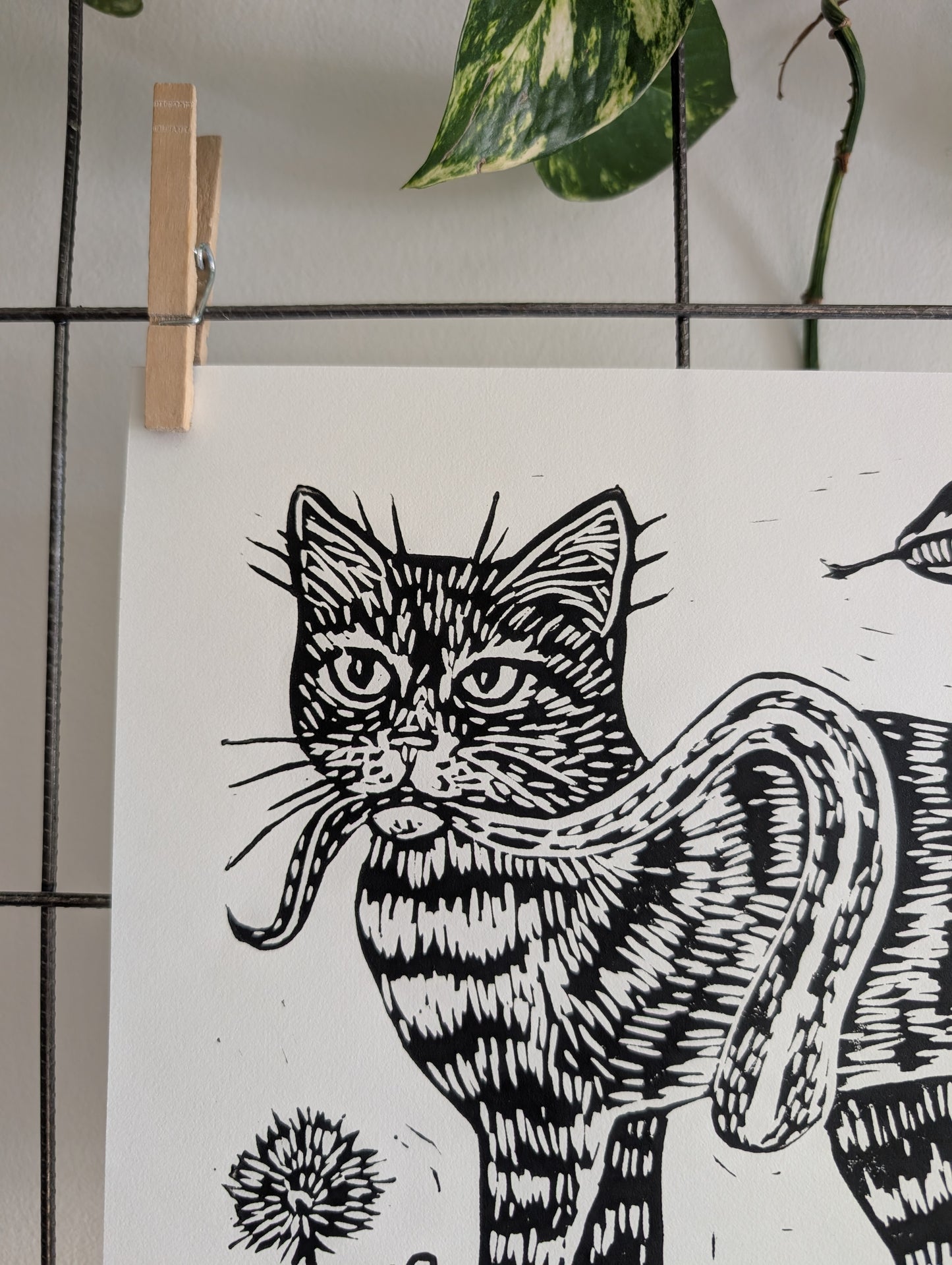 handprinted blockprint | caught (snake coiled around cat)