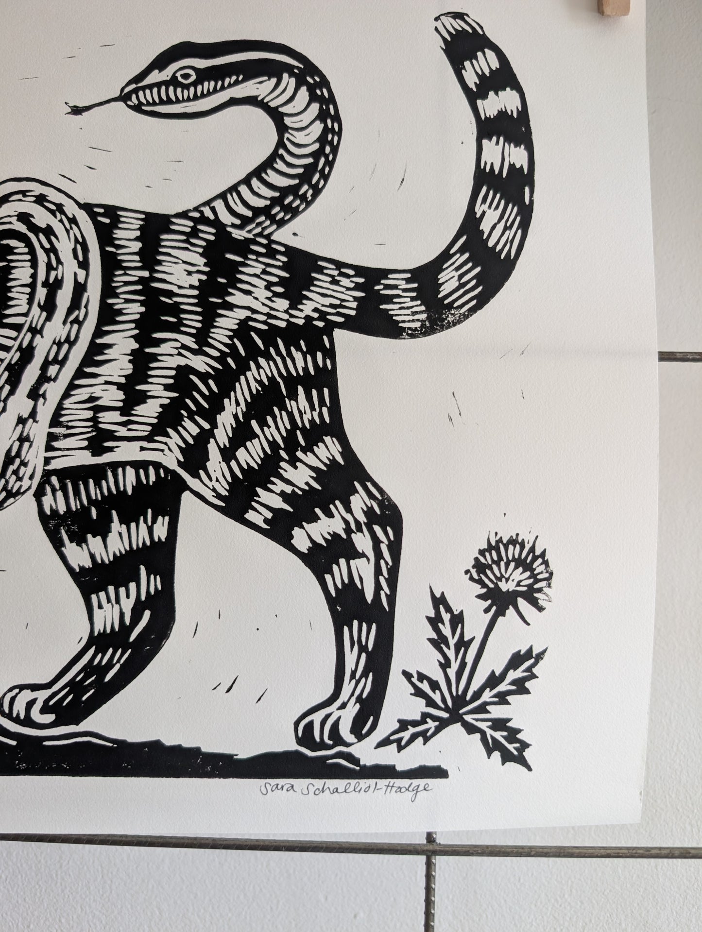 handprinted blockprint | caught (snake coiled around cat)