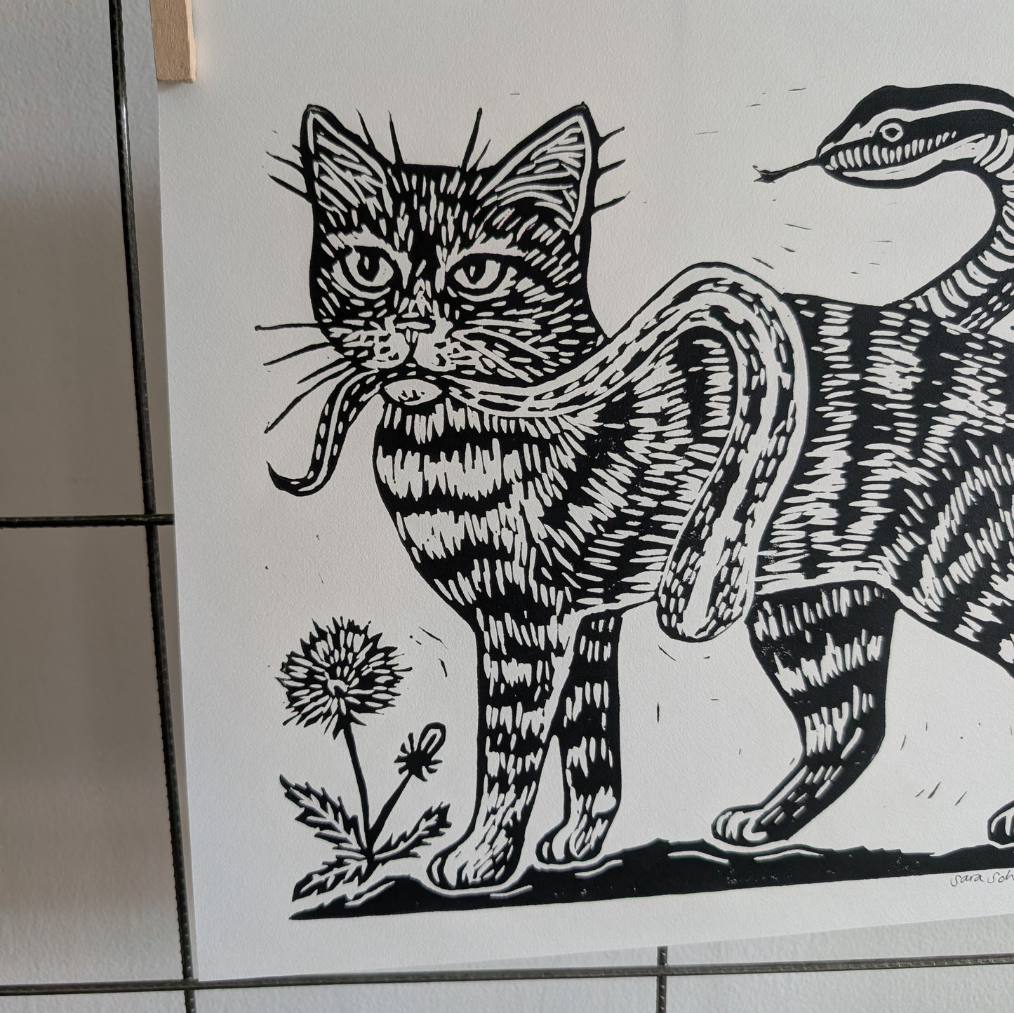 handprinted blockprint | caught (snake coiled around cat)