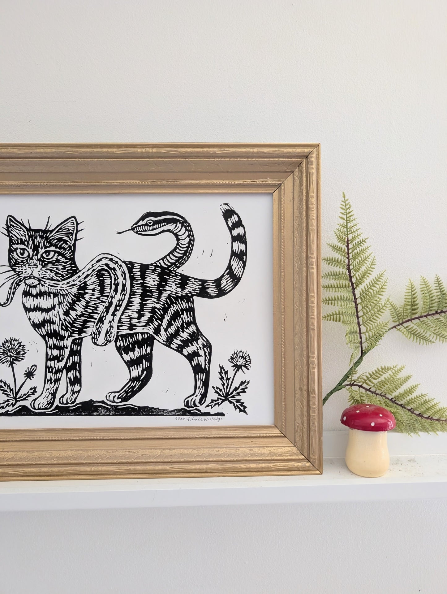 handprinted blockprint | caught (snake coiled around cat)