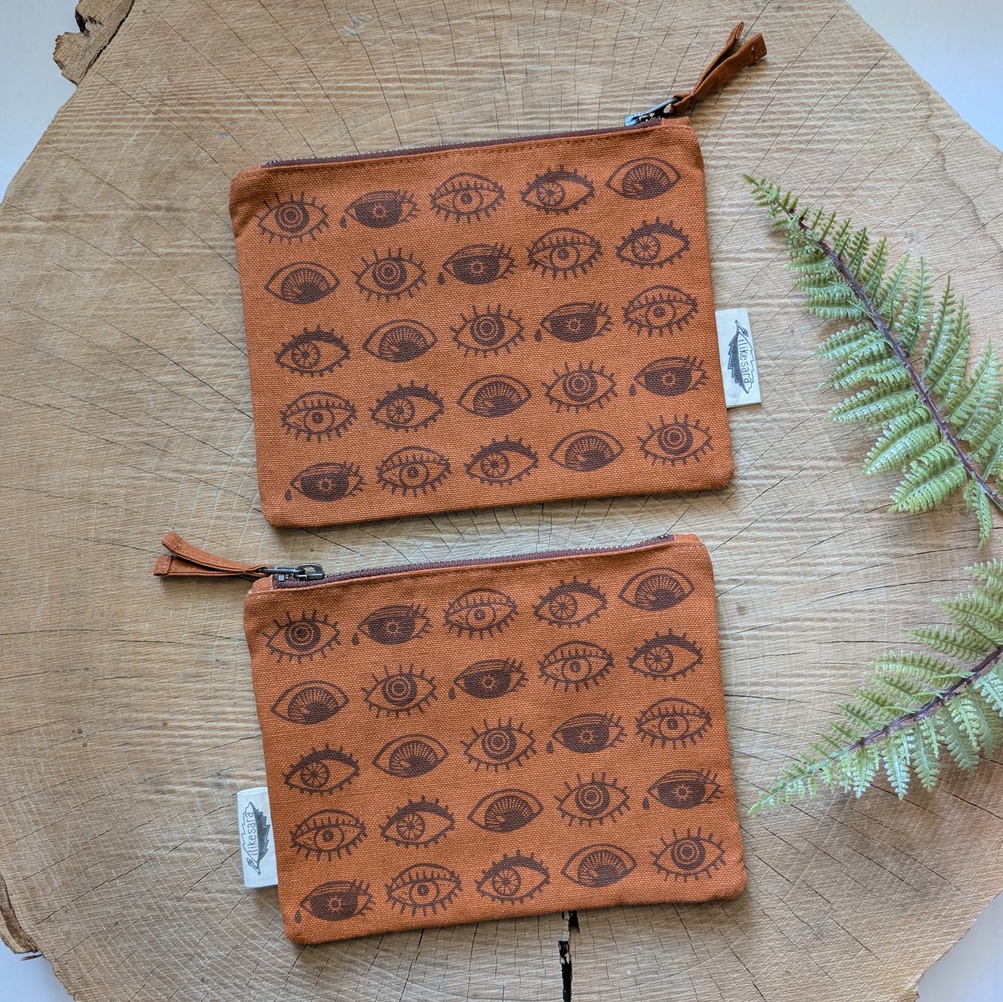 zippered pouch | eyeball - rust orange eye blockprint pencil, supply, makeup bag with waterproof lining