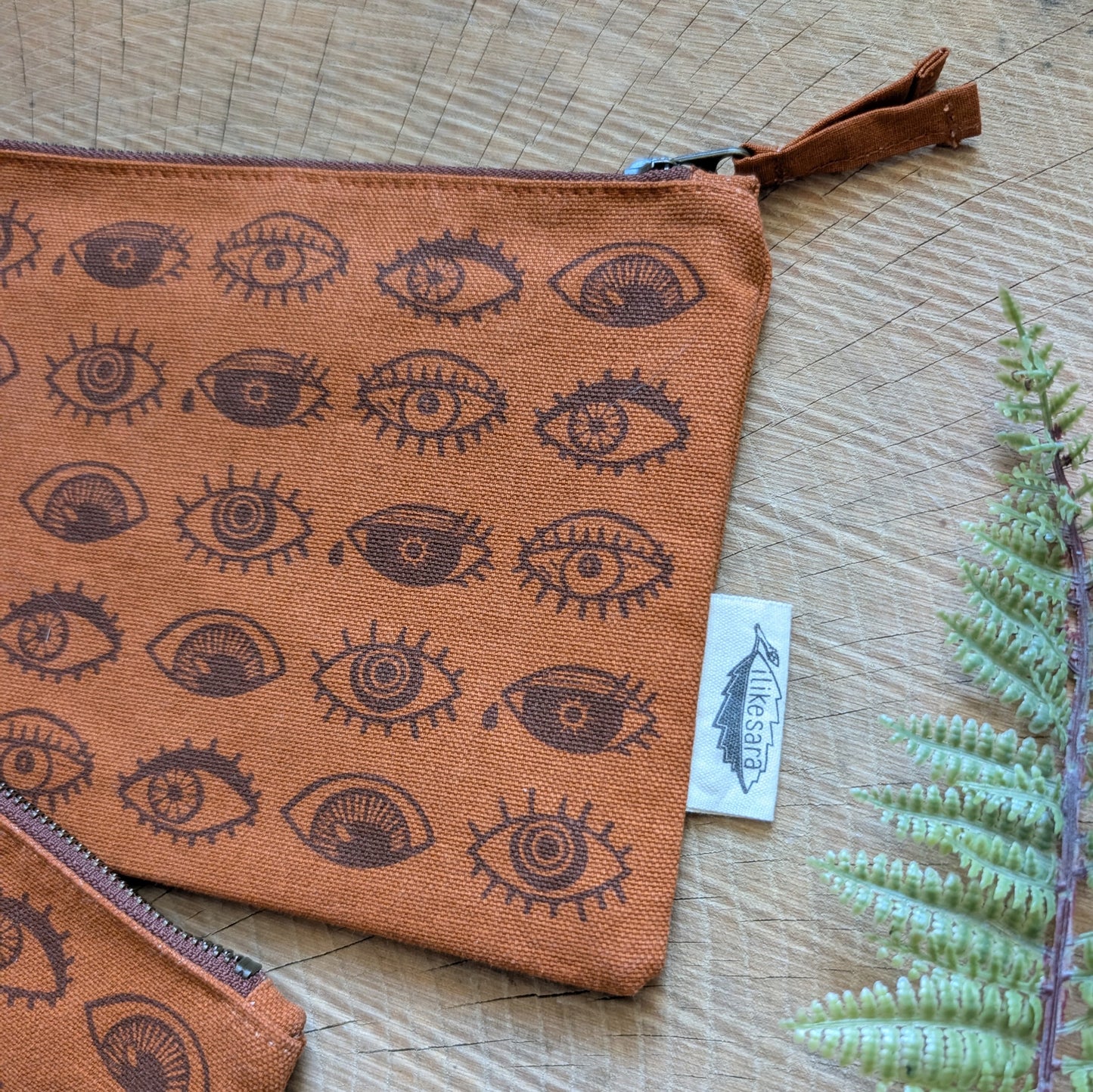 zippered pouch | eyeball - rust orange eye blockprint pencil, supply, makeup bag with waterproof lining