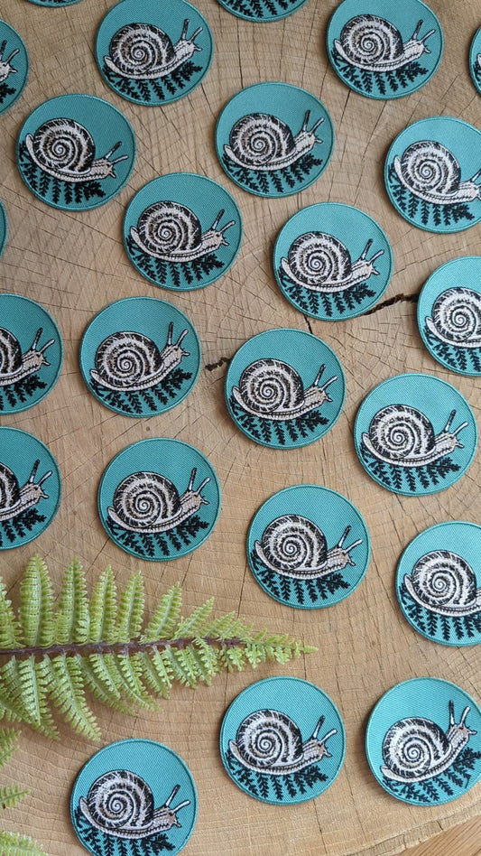 iron-on patch | snail with fern - 2.5" round teal