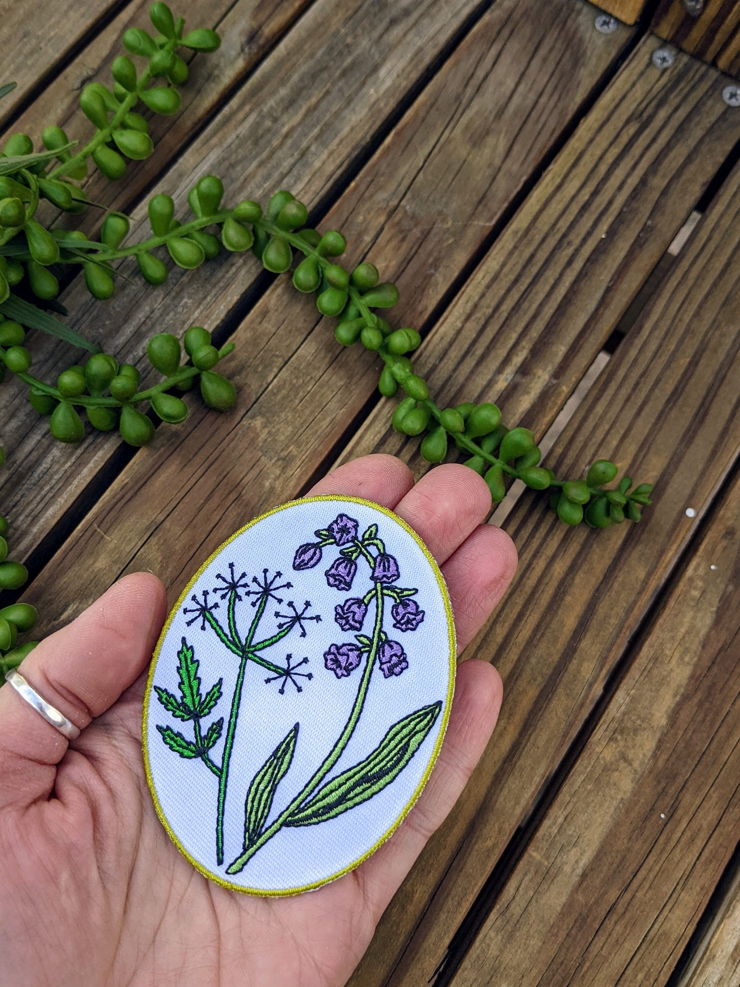 iron-on patch | pretty poison - oval flowers 3.25" x 2.5"